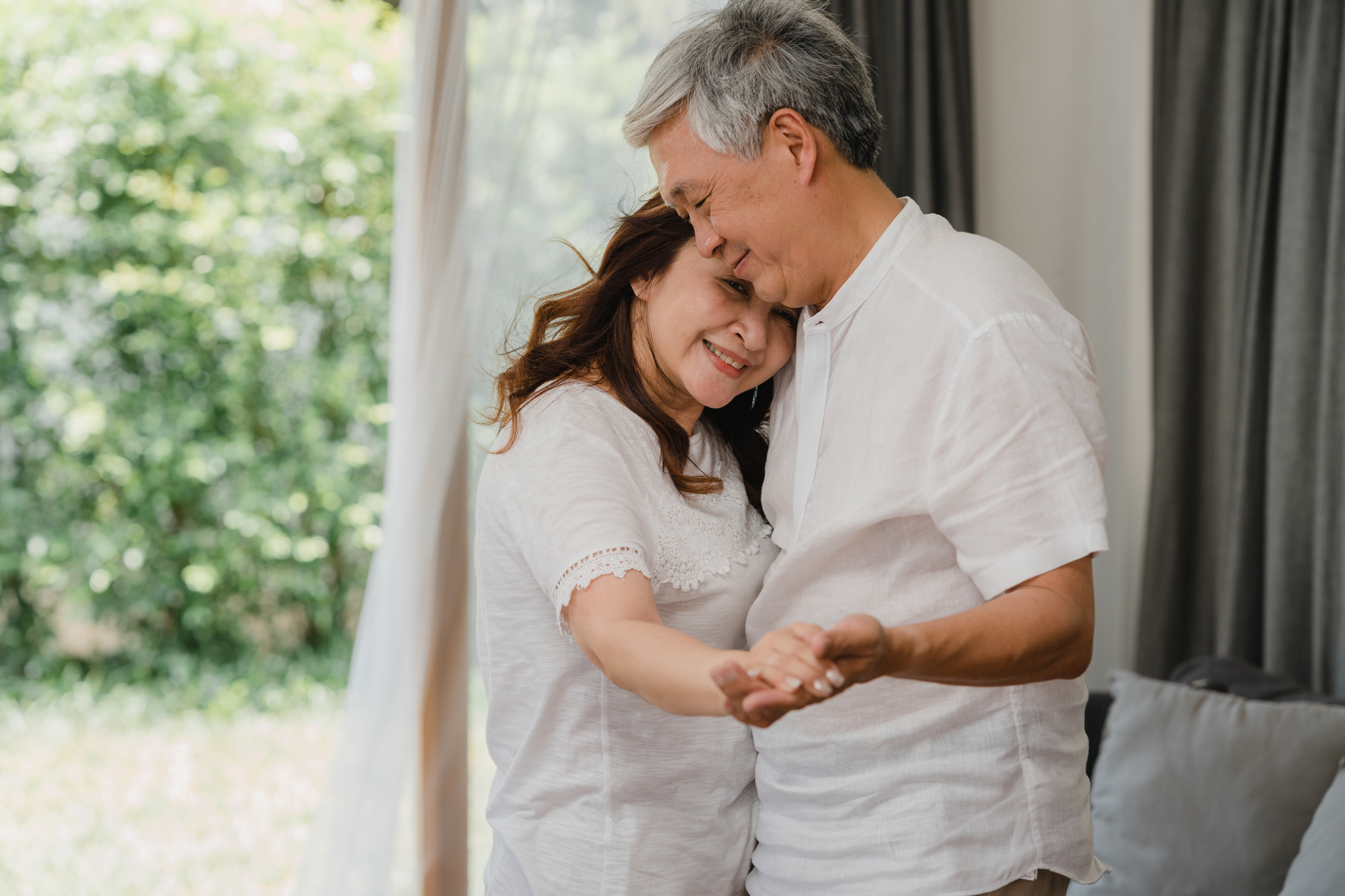 https://img.moneyduck.com/article_attachment/1661308312-asian-elderly-couple-dancing-together-while-listen-music-living-room-home-sweet-couple-enjoy-love-moment-while-having-fun-when-relaxed-home-lifestyle-senior-family-relax-home-concept.jpg