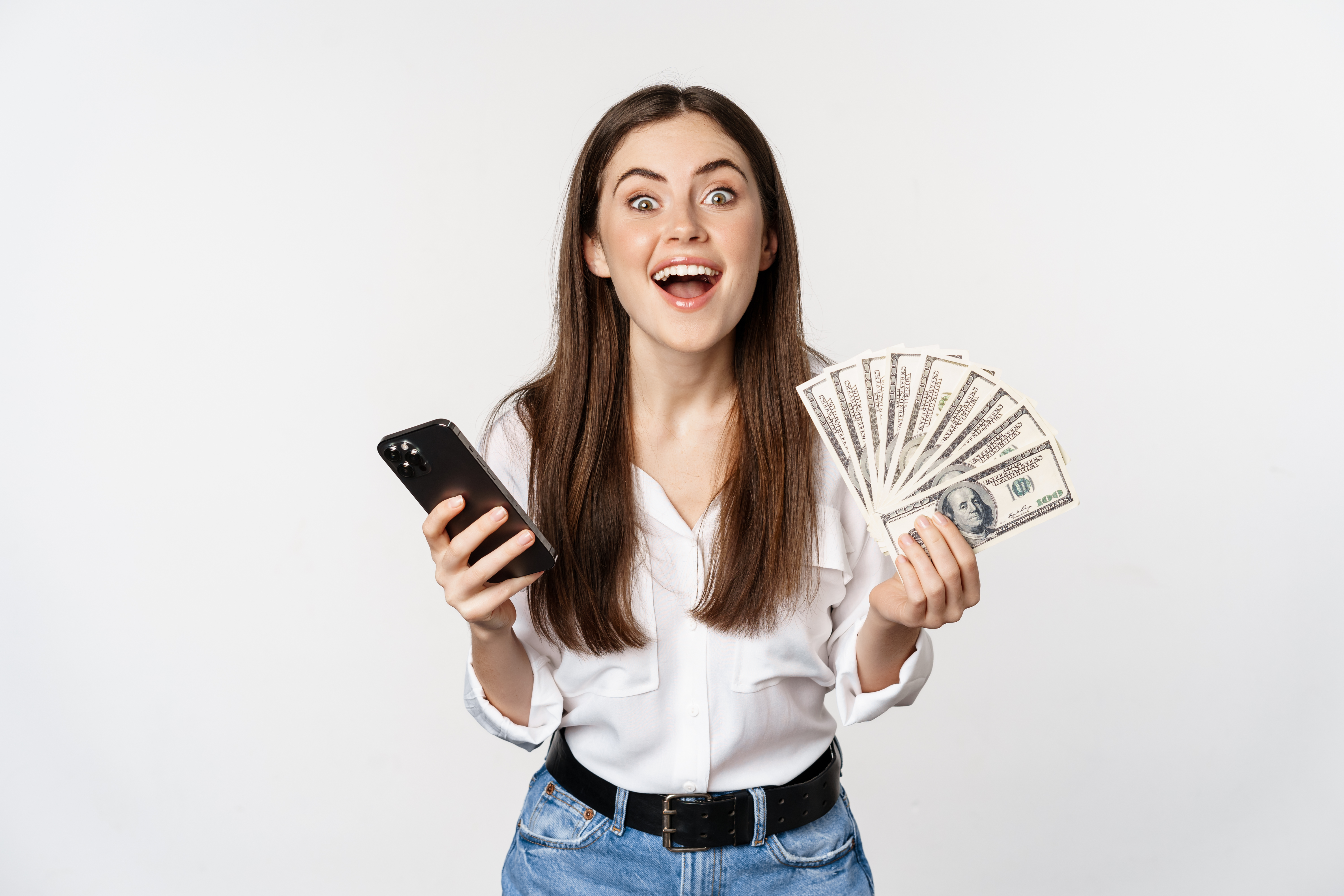https://img.moneyduck.com/article_attachment/1669271725-online-microcredit-loans-banking-concept-happy-woman-holding-mobile-phone-money-smiling.jpg