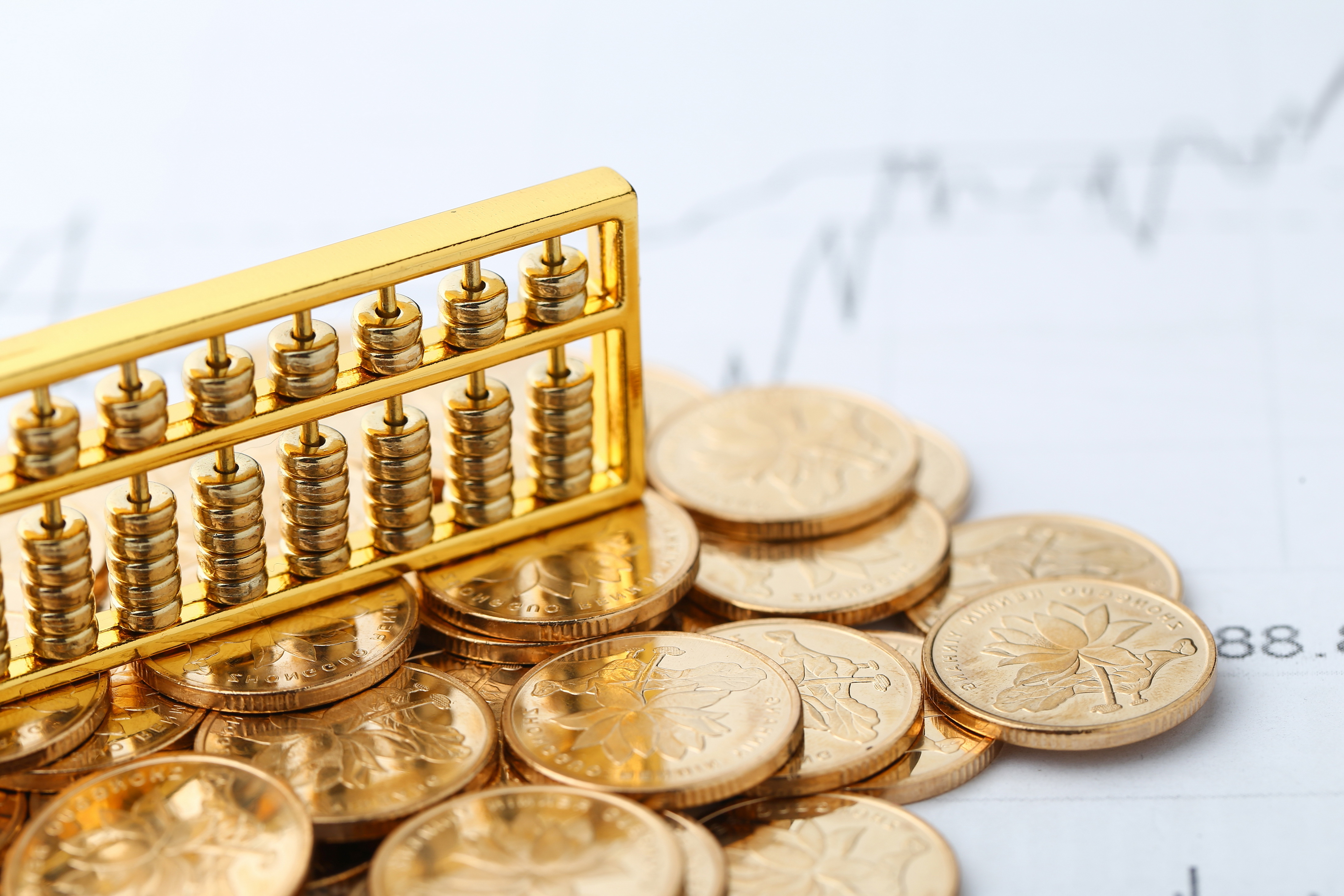 https://img.moneyduck.com/article_attachment/1672725831-golden-abacus-with-chinese-rmb-gold-coins-as-background.jpg